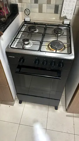 NIKAI 4-BURNER GAS COOKER WITH OVEN – ONLY AED 250!