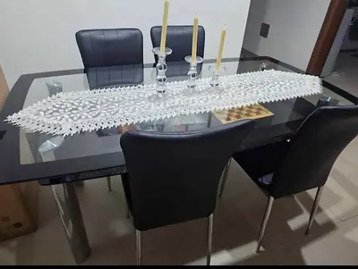 Glass Top Dining Table with 6 Black Leather Chairs - Good Condition