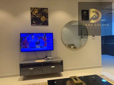 For monthly rent: a furnished one-bedroom apartment (bedroom and living room) in Muwaileh, Sharjah. Includes access to a gym, swimming pool, parking,