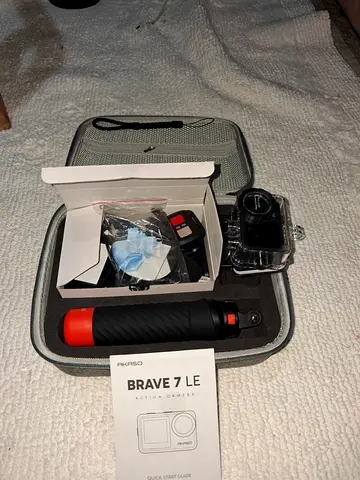 AKASO Brave 7 LE action camera with accessories and case