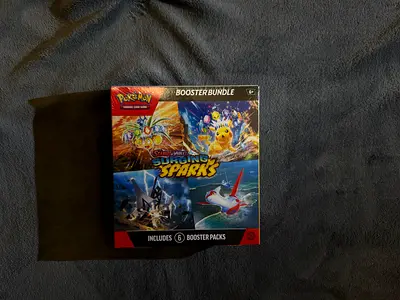 Pokémon TCG: surging sparks Booster Bundle (sealed booster box shown)