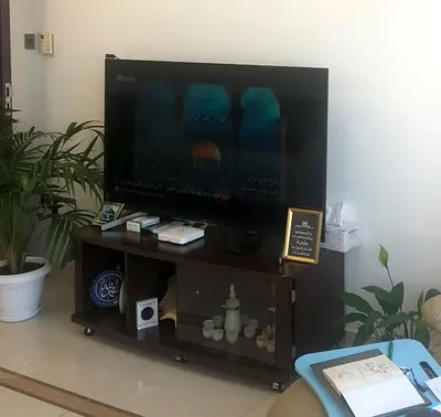 TV with wooden TV cabinet / entertainment unit in good condition