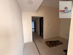 Very spacious studio for annual rent in Al Rashidiya 3, Ajman | Separate kitchen and built-in cabine