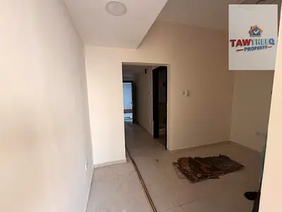 Very spacious studio for annual rent in Al Rashidiya 3, Ajman | Separate kitchen and built-in cabin