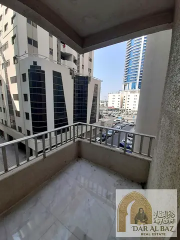 Discover a comfortable apartment in Al Majaz 1, Sharjah, featuring a practical layout, four balconies, and built-in wardrobes for convenient storage.