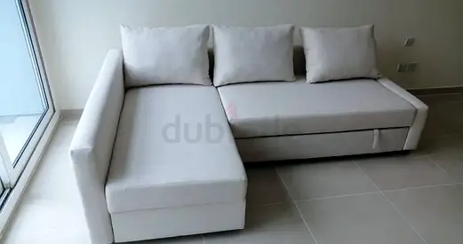 L-shaped sofa bed with storage, good condition