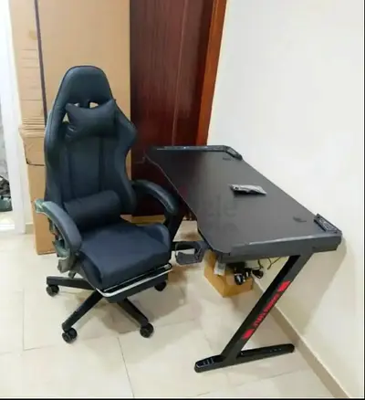 Gaming desk and ergonomic racing-style gaming chair bundle — good condition