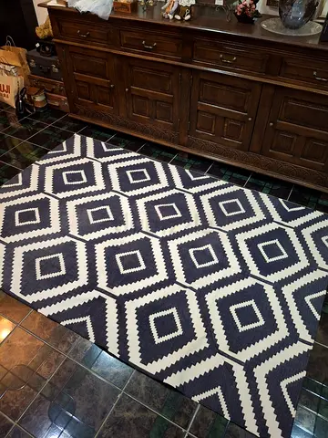 Black and white geometric Carpet- good condition