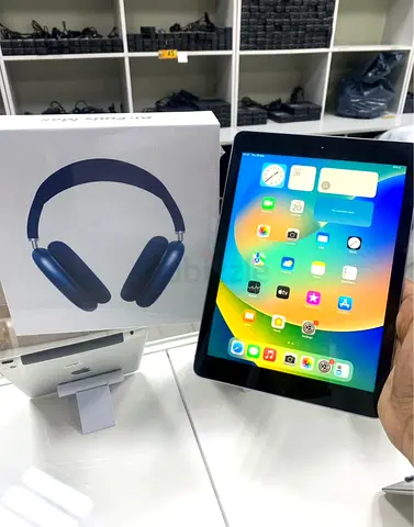 Apple iPad 5th generation 32GB with p9 (working) with sealed AirPods Max box - Good condition