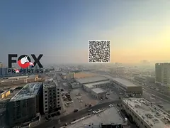 **2-Bedroom Apartment with Living Room for Sale in Garden City Towers – Al Hamidiyah, Ajman** A gr