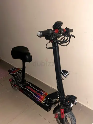 Used electric scooter with seat — sturdy city commuter
