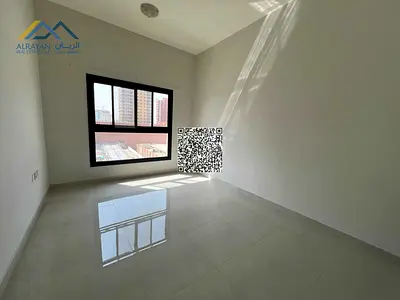 Two rooms and a living room, opposite Al-Hikma Schools, close to amenities.