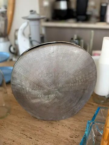 Silver textured ceramic disc vase, round flat
