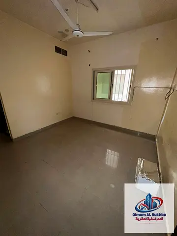 Excellent location in Al Nab'ah, Sharjah: A unit featuring a bedroom, a spacious living room, a tidy kitchen, and a clean bathroom. Includes air condi