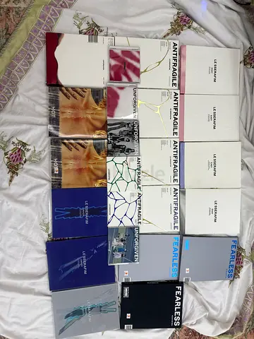 23 LESSERAFIM ALBUMS no pc mostly no discs partially damaged pages are ripped