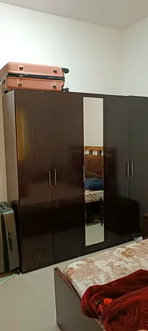 Dark wood 4-door wardrobe with mirror - good condition