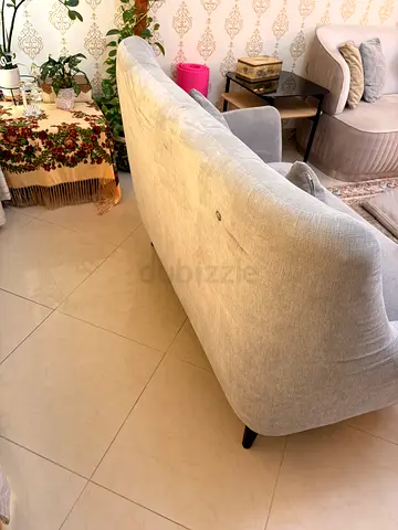 Light grey 2-seater sofa in good condition