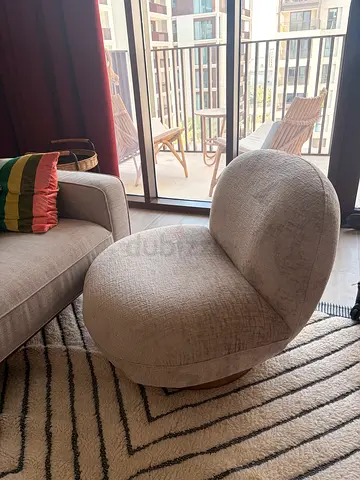 Home Centre Living Room Swivel Chair