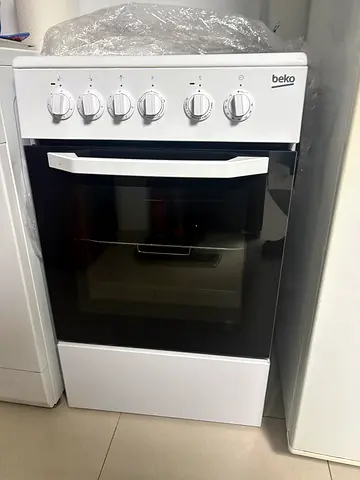 LG 7kg Front Load Washing Machine + Beko 4-Burner Electric Cooker – Good Condition