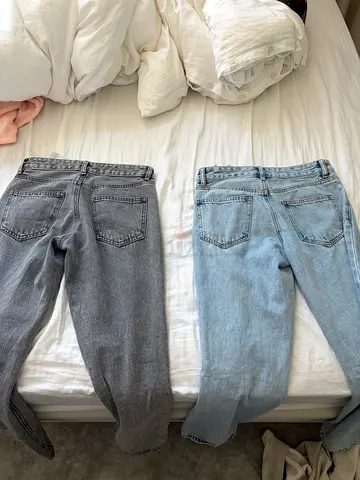 Two pairs of women's jeans - light blue and grey, size small