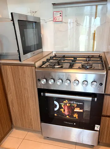Bompani stainless steel freestanding gas cooker with oven - good condition