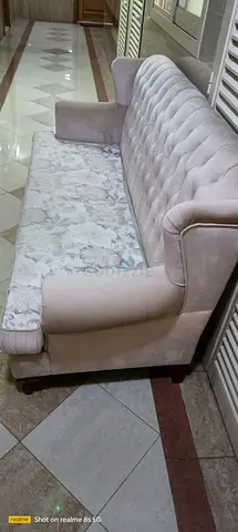 3-seater tufted fabric sofa in good used condition