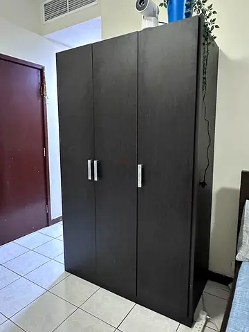 Dark wood 3-door wardrobe / armoire in excellent condition