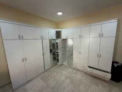 دولاب ملابس مستعمل أبيض كبير (زاويه)