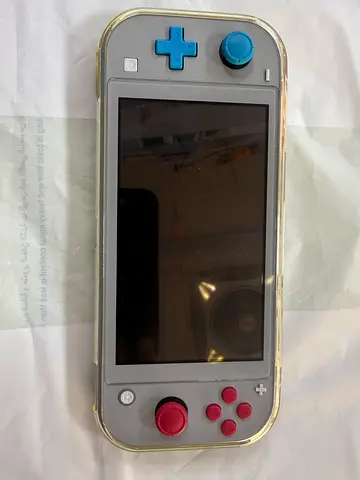 Grey Nintendo Switch Lite pokeman edition with colorful buttons - good working condition
