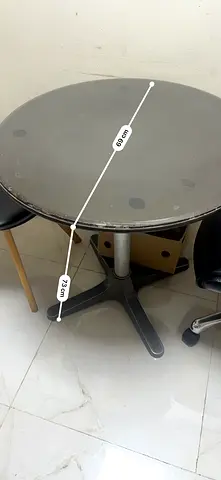 Round metal café table, 68cm diameter, sturdy base - used