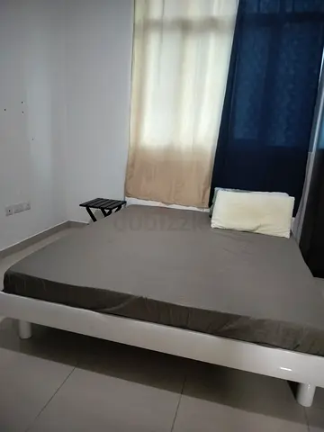 Double bed with comfortable mattress in used condition. White bed frame. Good for home or apartment.