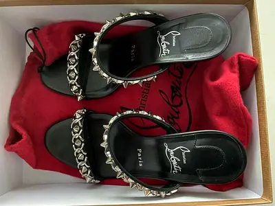 Christian Louboutin Ladies medium high heels