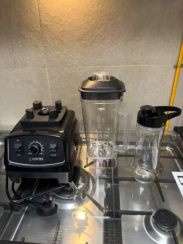 Brand new commercial blender with smoothie bottle