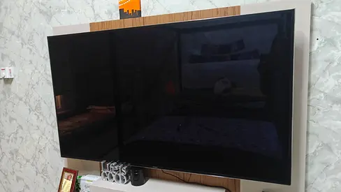 55-inch LED TV in good condition - wall mounted
