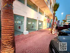 Luxury Glass Storefront Modern Finish in Ajman's Most Vibrant Street