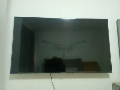 48-55 inch Flat Panel LED TV - Wall Mounted, Good Condition TV screen is damaged