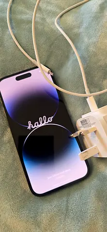 iPhone 14 Pro (or similar) with charger - Good working condition