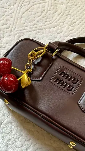 Miu miu Designer-Style Handbag with cherry charm