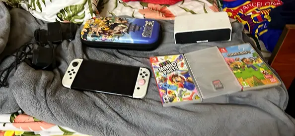 Nintendo Switch console with games, case and accessories - used