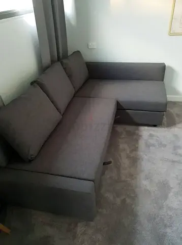 L-shaped Grey Fabric Sofa bed Good Condition