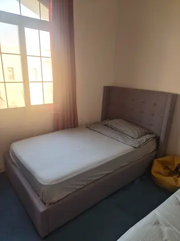 Upholstered double bed with tufted headboard - good condition
