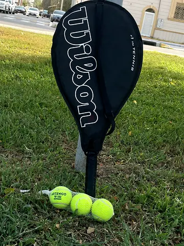 Wilson tennis racket with cover - used