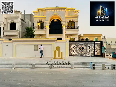 Classic-style villa in Al Muwaihat, featuring two floors and a roof terrace; 5,000 sq. ft. area; freehold ownership available to all nationalities.