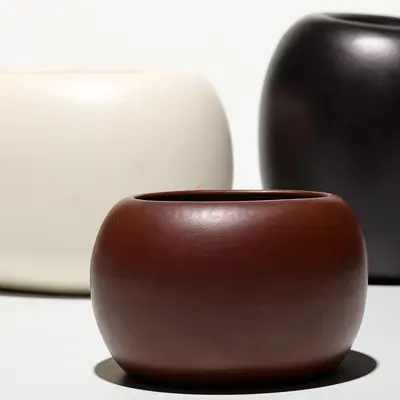 Tom Ford for Gucci b.1961 Collection of three bowls USA, c. 1990 glazed earthenware