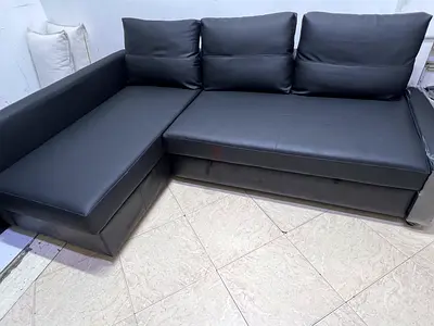 L-shaped Black Faux Leather Sofa -bed Good Condition