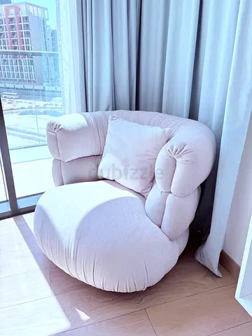 Plush Curved Accent Armchair in Light Beige