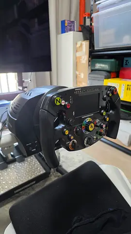 Thrustmaster t300 with ferrari f1 steering wheel controller with load cel pedals.