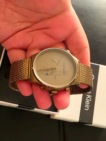 Calvin Klein gold-tone men's watch with mesh bracelet (works well)