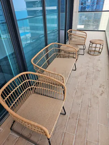 3 Rattan outdoor chairs with 2 tables
