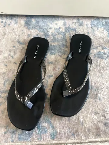 Black Tahari rhinestone strap flip-flops